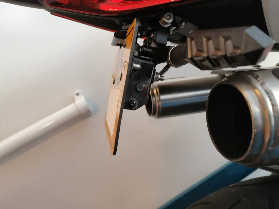 motorcycle plate flipper by ReVamp Motorcyles. Easy DIY fit flippers